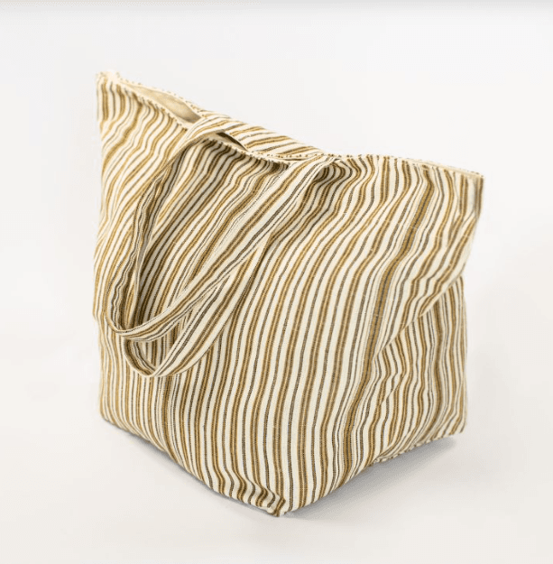 Striped cloth bag in ochre colors