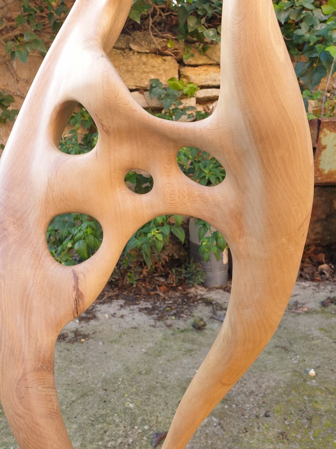 Detail of the finish and perforations of the sculpture "Helix"