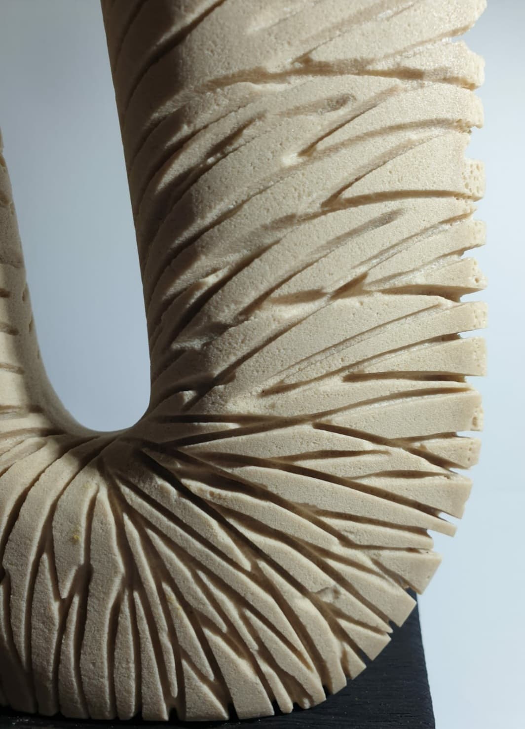 Detail of the striations on the surface of the sculpture.
