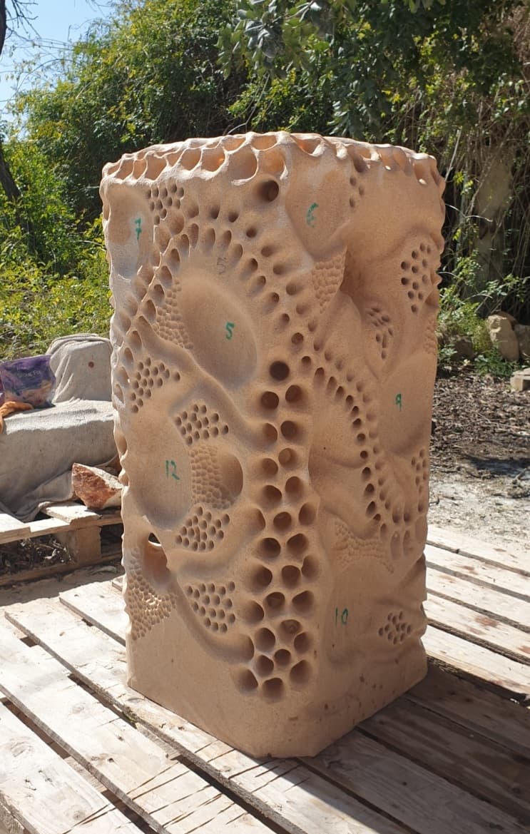 Sculpture prepared to receive the small mini-sculptures shelter from insects.