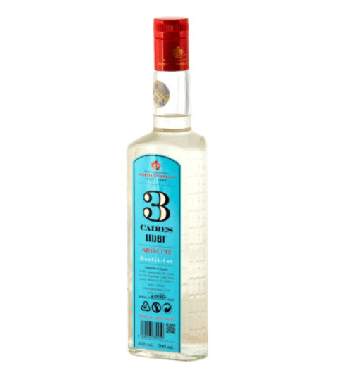 Side view of Tres Caires anise bottle