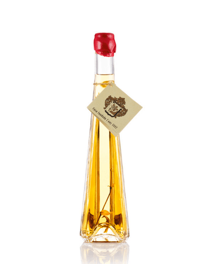 Botella pequeña de hierbas secas