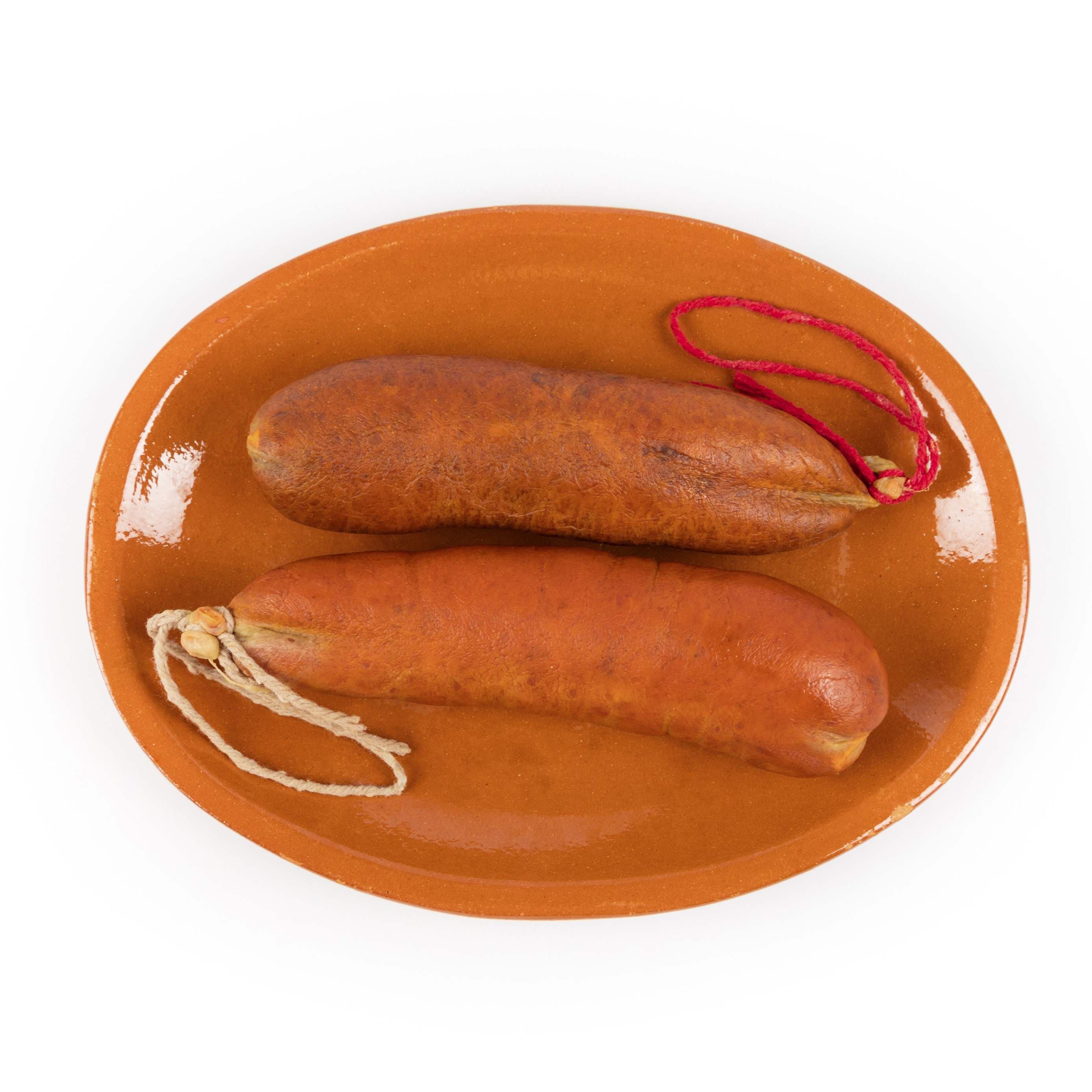 Piece of Mallorca Sobrasada from Duroc CRISOL pork made with Duroc pork and cured in natural casing according to the traditional recipe.